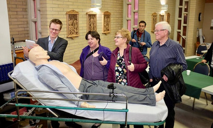 Radiothon Supporters Try Out Medical Simulation